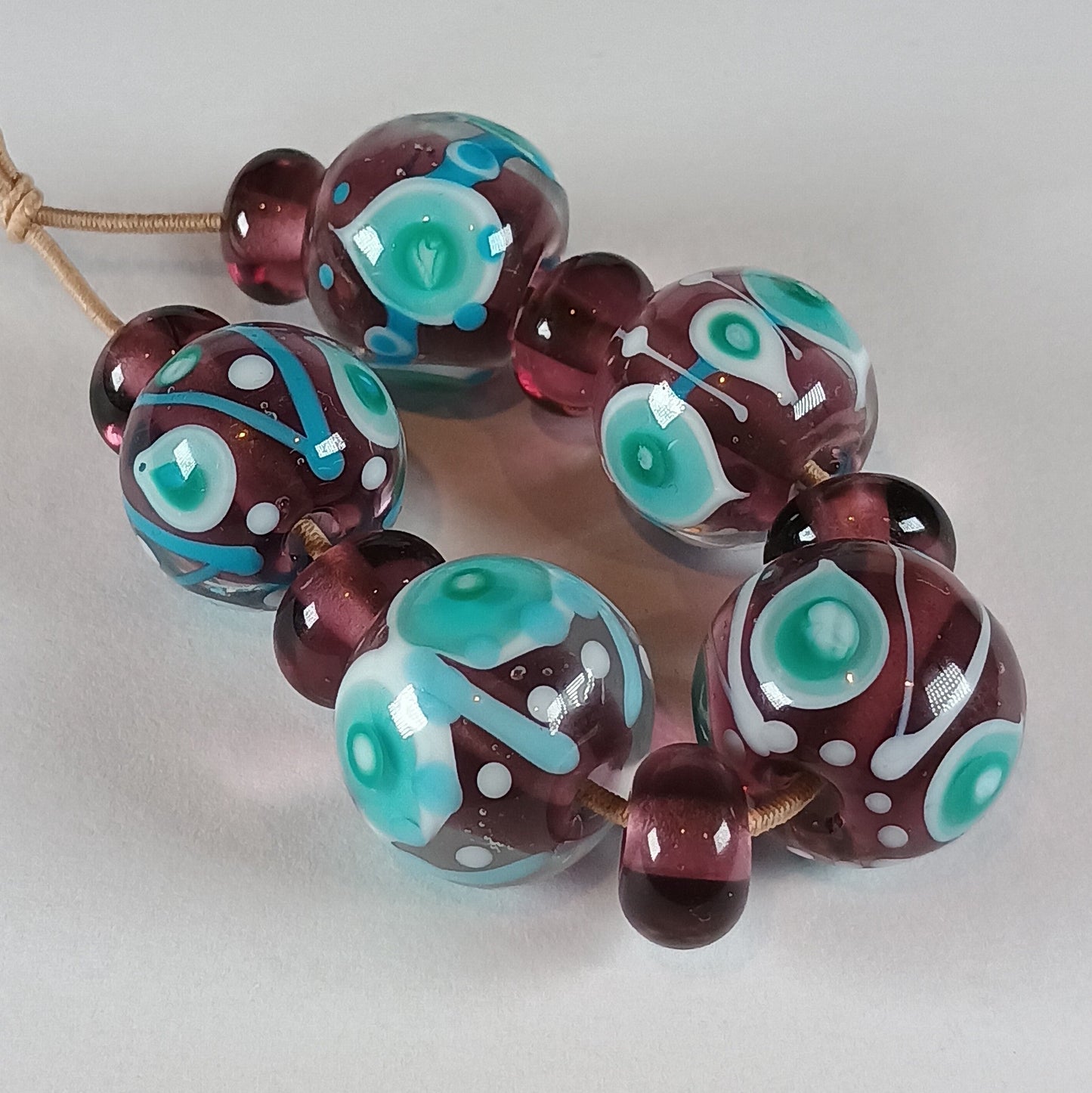 Purple, turquoise and white stacked dot lampwork glass bead set Jolene Beads