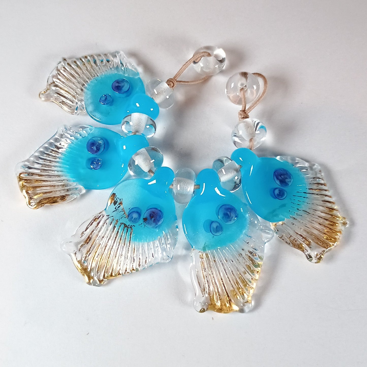 Blue and clear glass butterfly wing bead set with gold leaf Jolene Beads