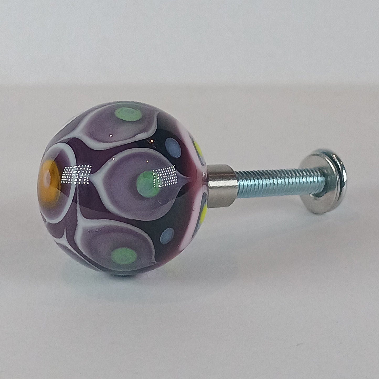 Purple and orange stacked dot glass knob