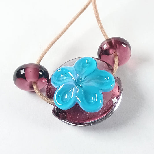 Purple, white and aqua flower lentil bead with spacers Jolene Beads
