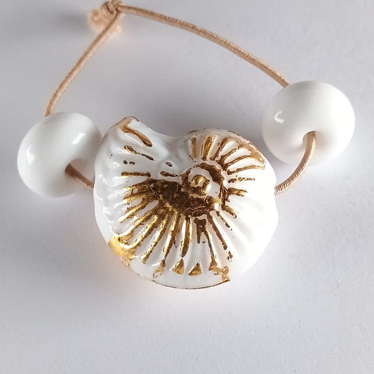 Small opal blue ammonite bead with gold leaf Jolene Beads