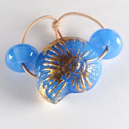Small opal blue ammonite bead with gold leaf Jolene Beads