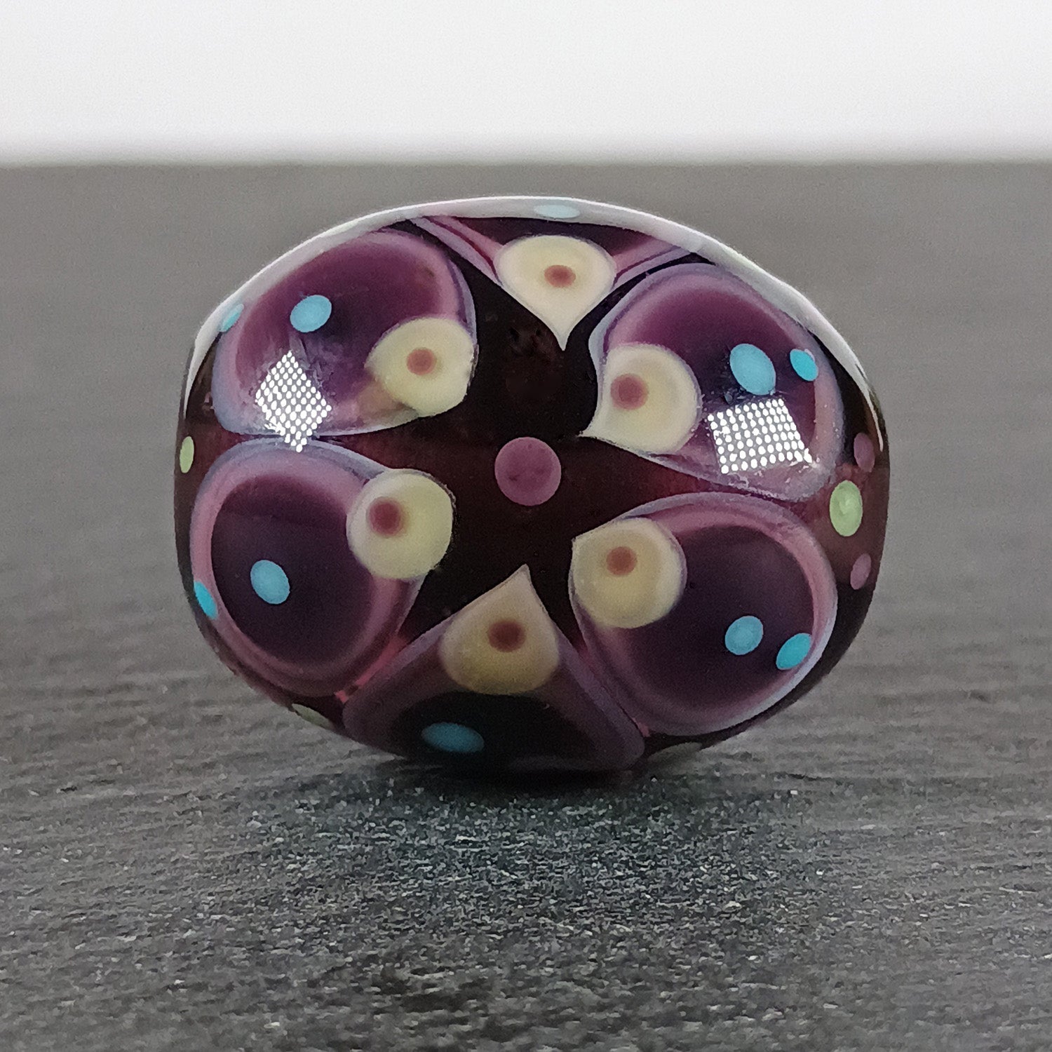 Dark purple and amber chunky oval mandala lampwork focal bead Jolene Beads