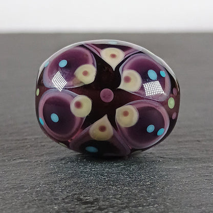 Dark purple and amber chunky oval mandala lampwork focal bead Jolene Beads