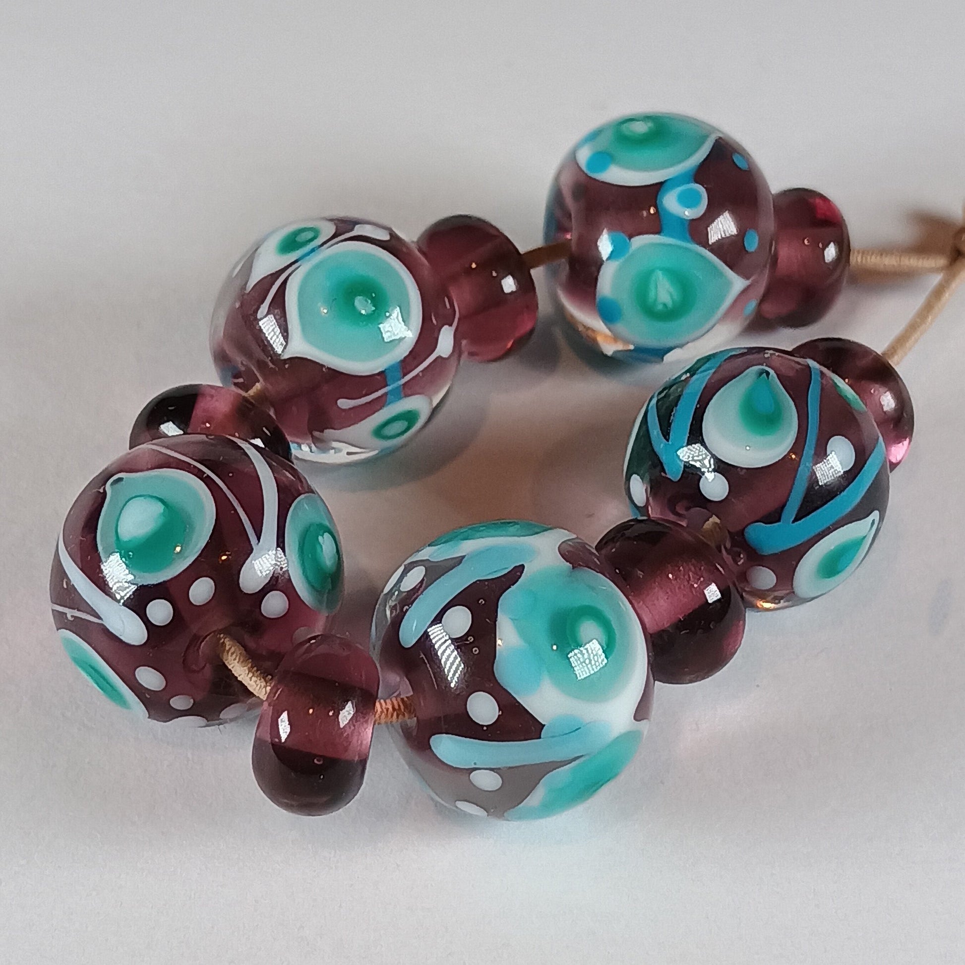 Purple, turquoise and white stacked dot lampwork glass bead set Jolene Beads