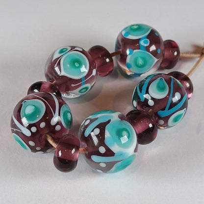 Purple, turquoise and white stacked dot lampwork glass bead set Jolene Beads