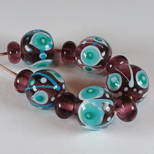 Purple, turquoise and white stacked dot lampwork glass bead set Jolene Beads