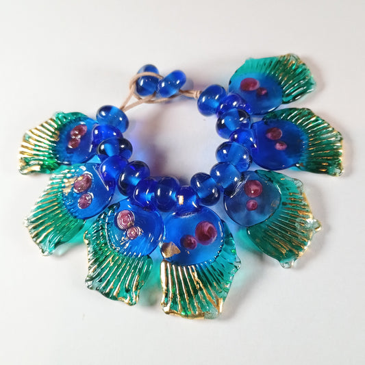 Blue and teal glass butterfly wing bead set with gold leaf Jolene Beads