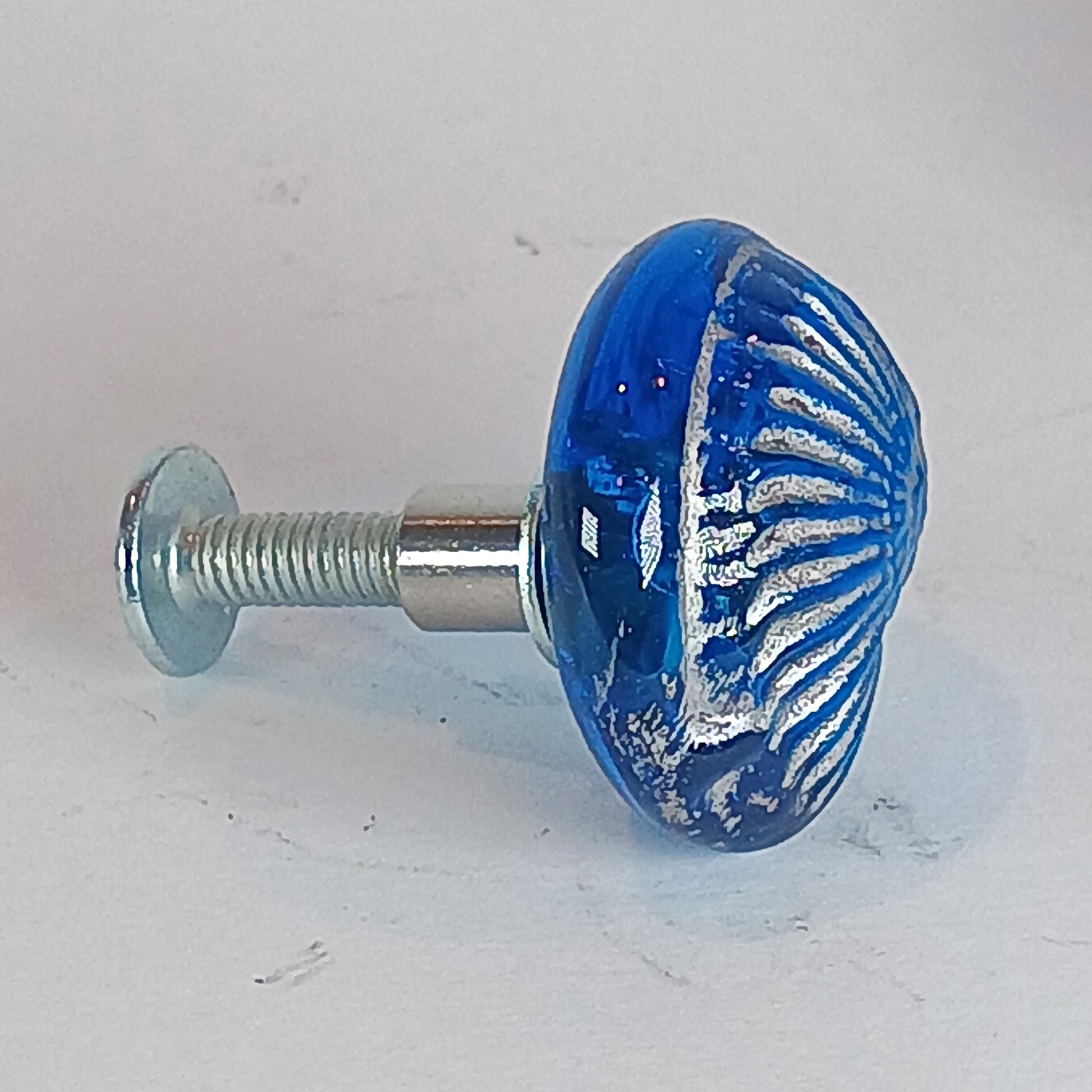 Blue glass knob with silver shell pattern for cabinet doors or drawers