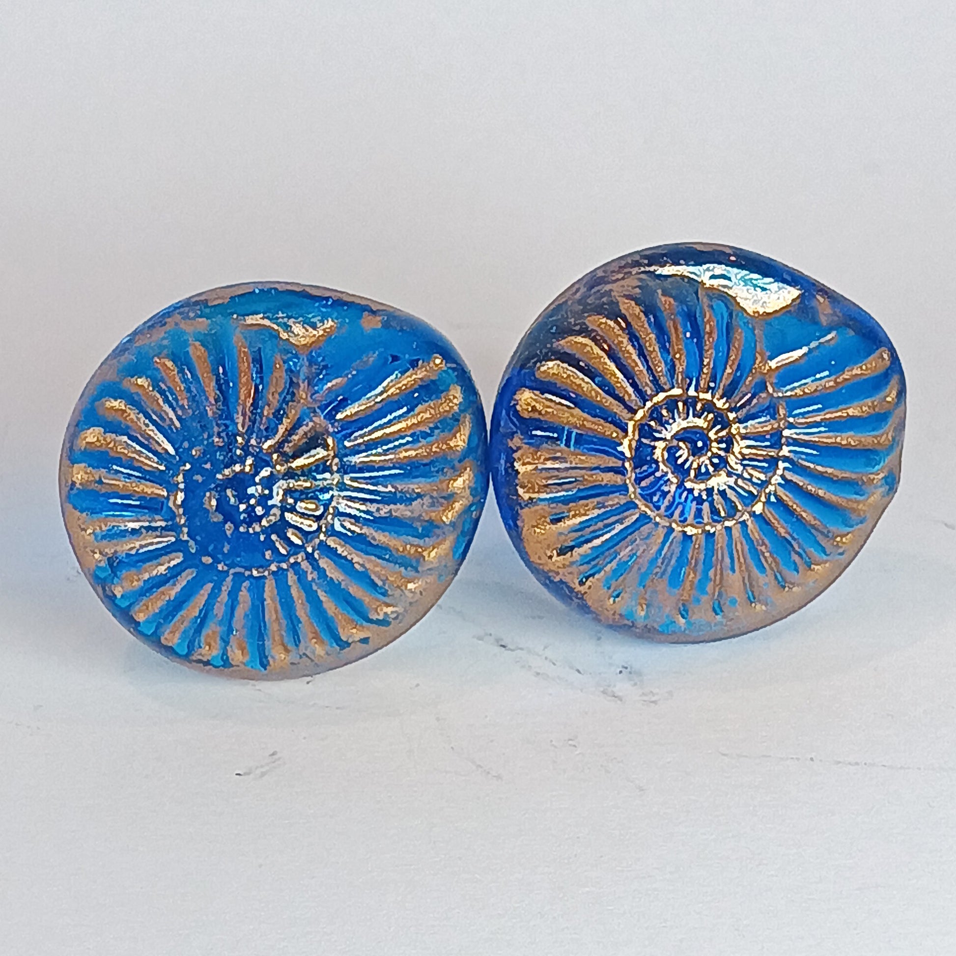 Beach themed aqua blue glass cabinet knobs. Handmade lampwork shell handles with gold deatil