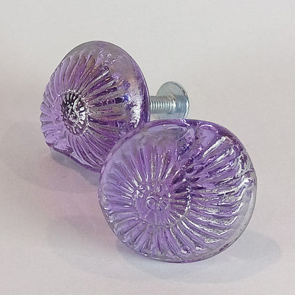 Two purple shell glass cabinet knobs 