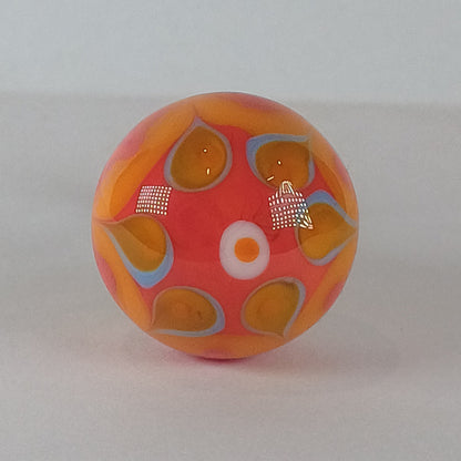 Decorative glass draw knob with orange and blue patterns