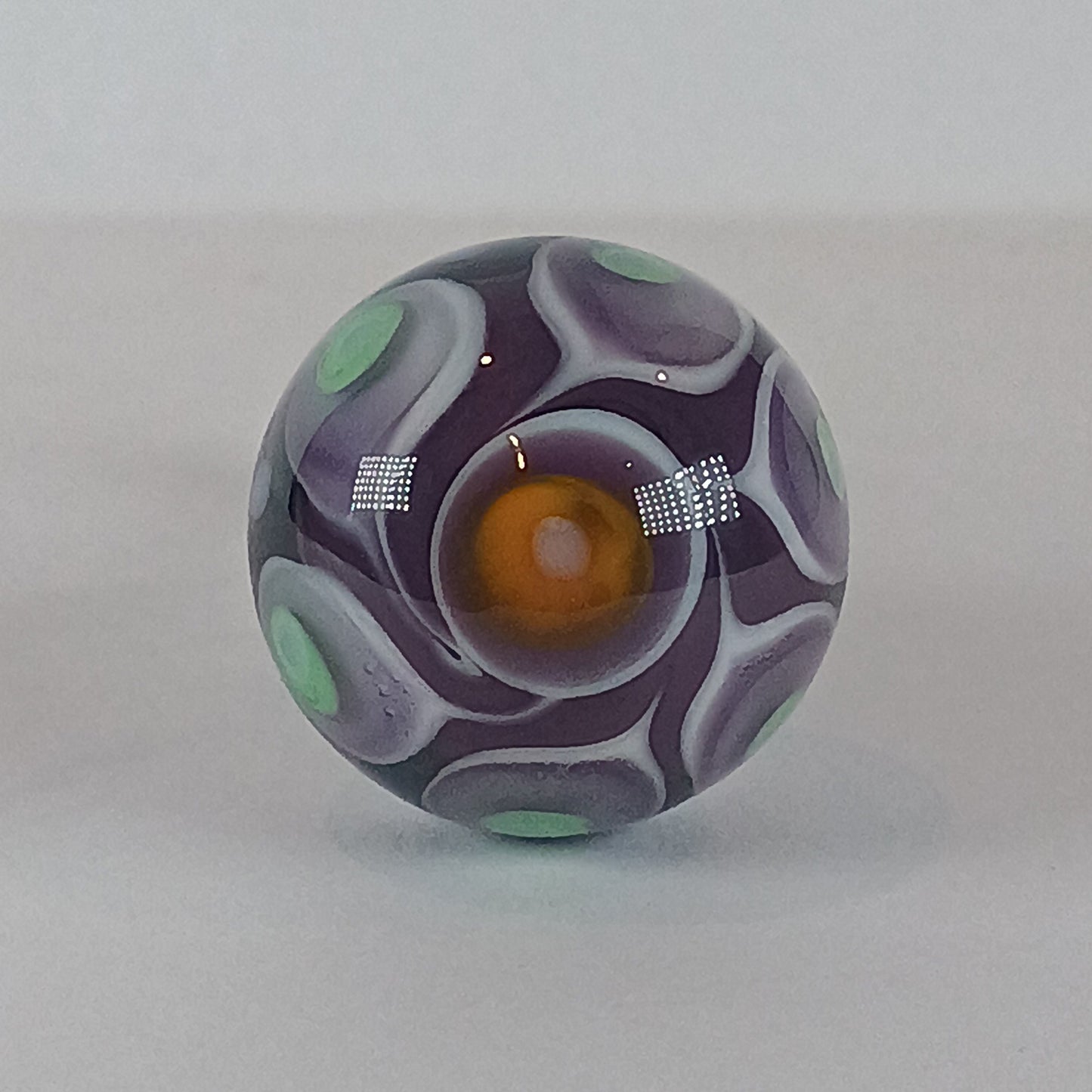 Purple and orange stacked dot glass knob