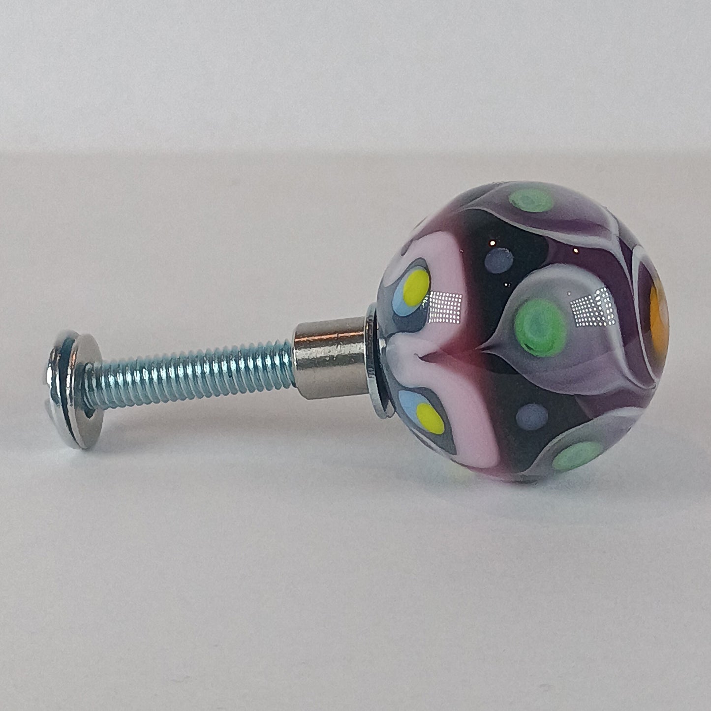 Purple and orange stacked dot glass knob
