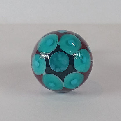 Purple, pink and teal stacked dot glass knob
