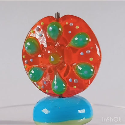 Bright orange straight sided lentil mandala lampwork bead