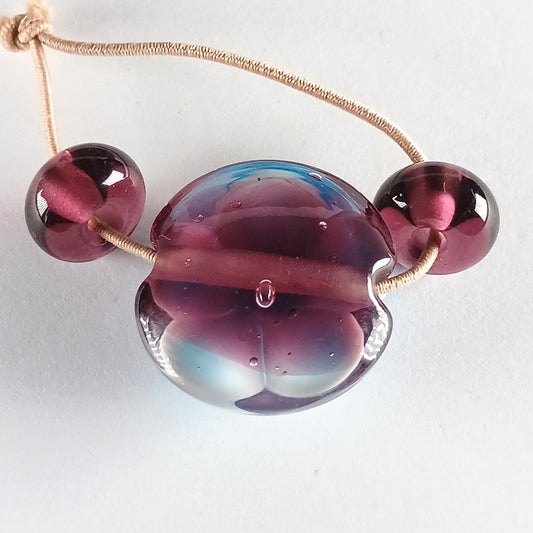 Purple, white and aqua flower lentil bead with spacers Jolene Beads