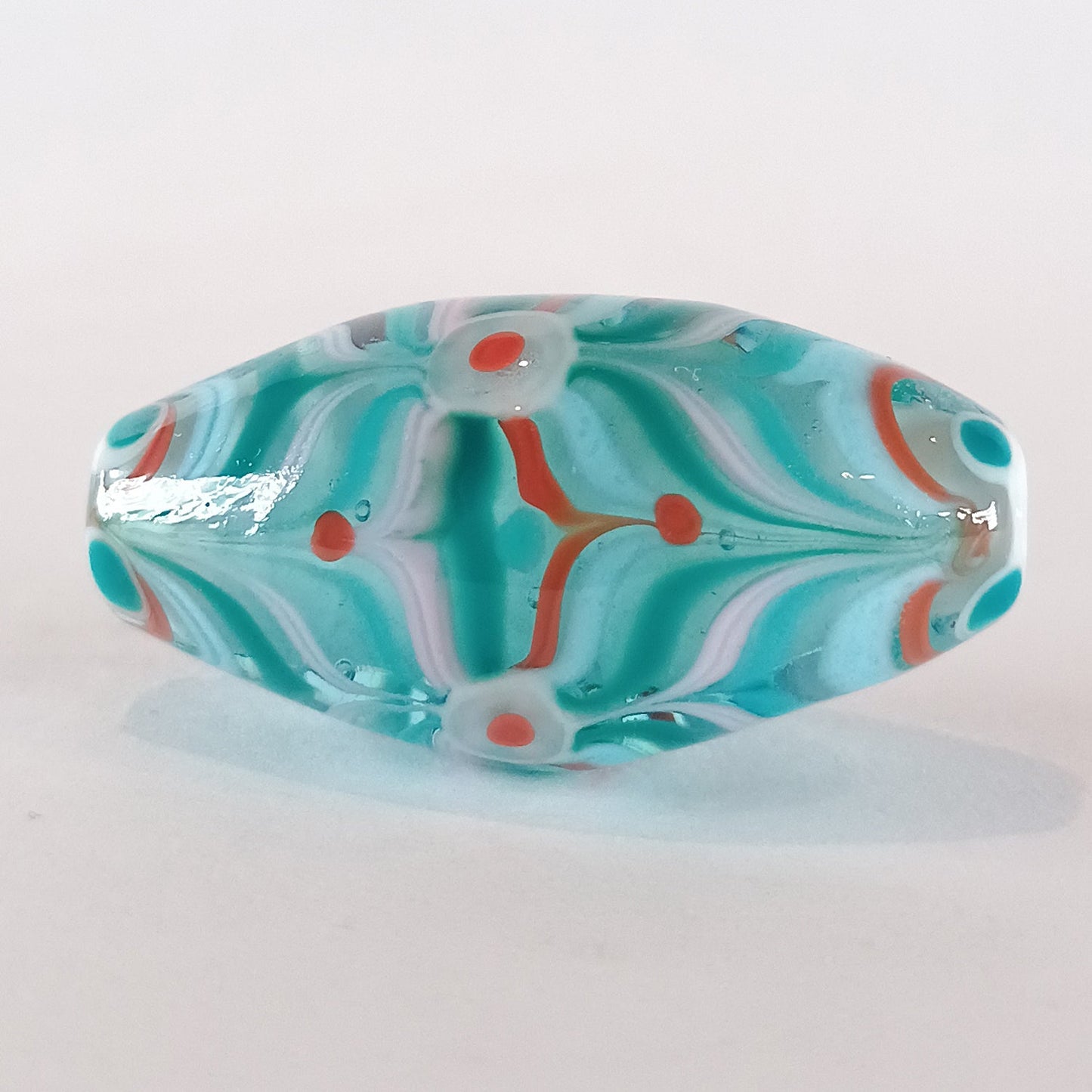 Encased pale blue raked bicone lampwork focal bead Jolene Beads