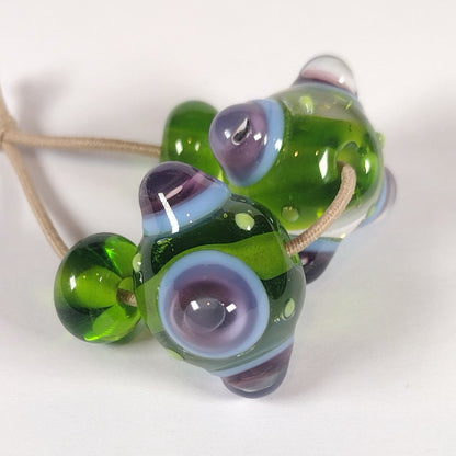 Green and purple bumpy lampwork bead pair (Copy) Jolene Beads