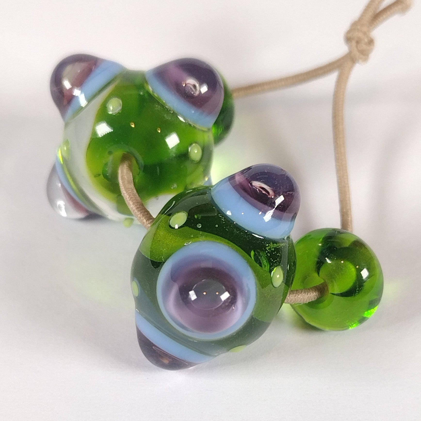 Green and purple bumpy lampwork bead pair (Copy) Jolene Beads