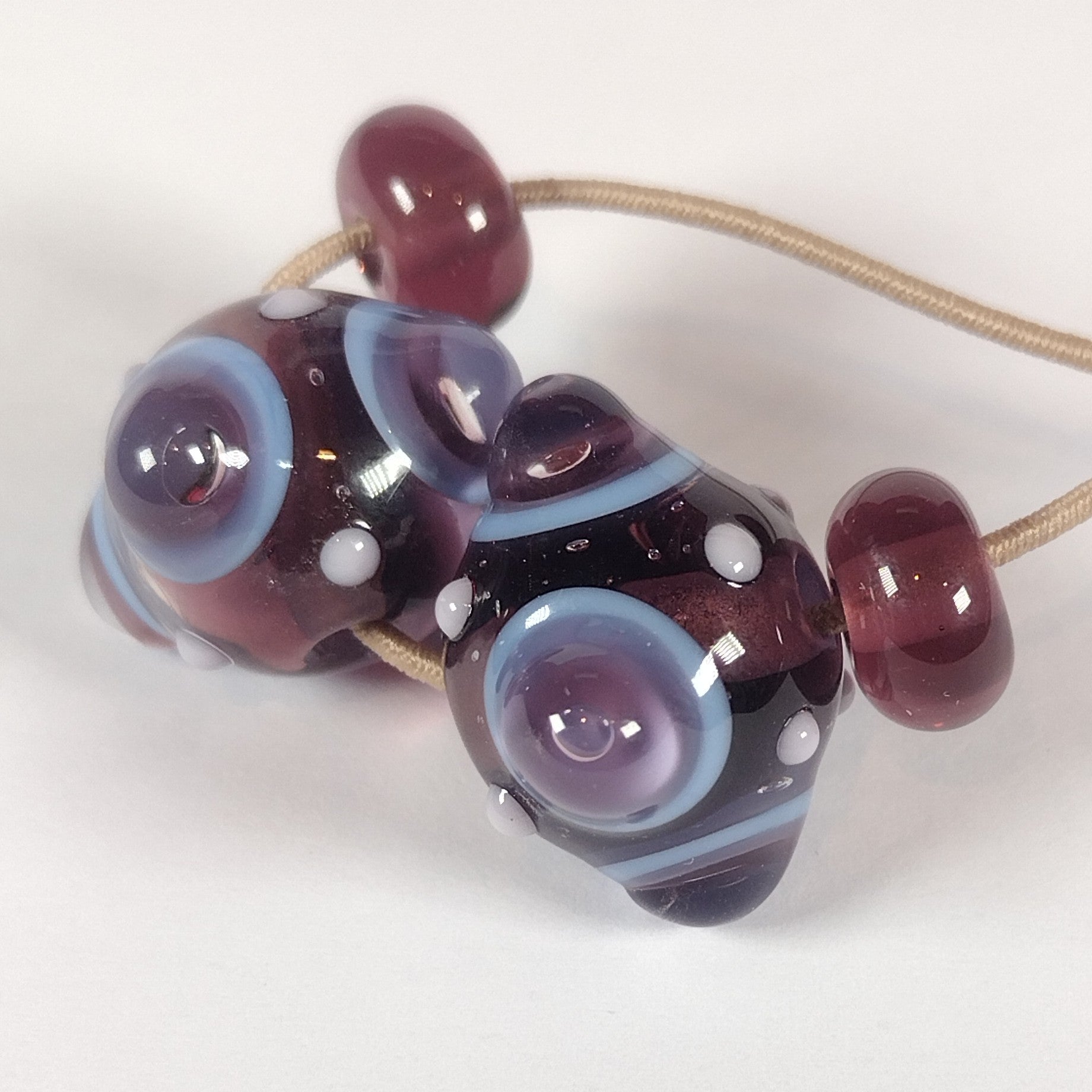 Purple and blue bumpy lampwork bead pair (Copy) Jolene Beads