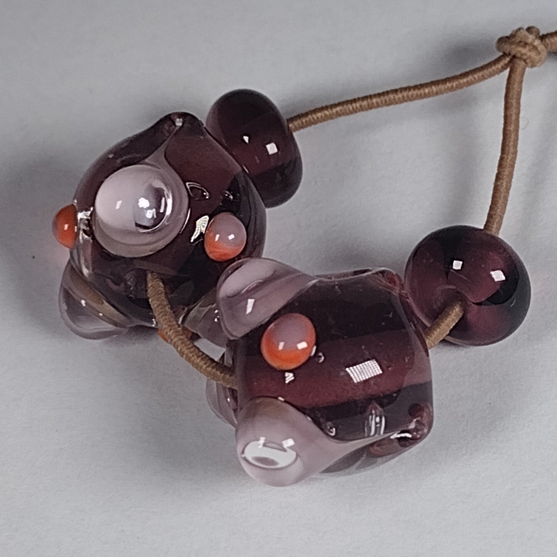 Double purple bumpy lampwork bead pair Jolene Beads